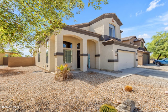 view of front of property featuring a garage