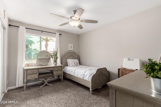 carpeted bedroom with ceiling fan