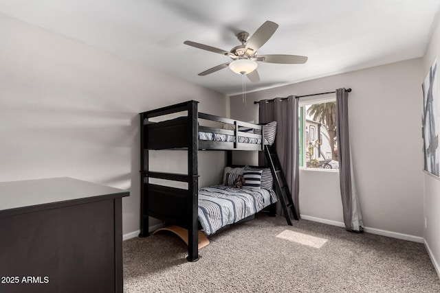 bedroom with carpet floors, baseboards, and a ceiling fan