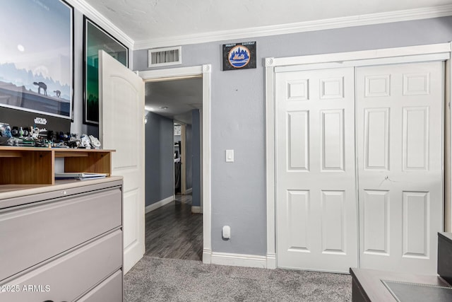 2110 W Morrow Dr, Phoenix, AZ 85027 - bedroom with crown molding, a closet, baseboards, and wood finished floors