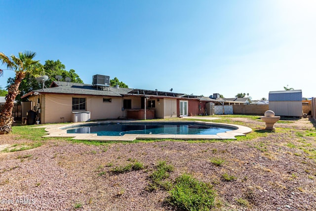 2110 W Morrow Dr, Phoenix, AZ 85027 - rear view of property with central AC unit and a fenced backyard