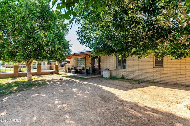2110 W Morrow Dr, Phoenix, AZ 85027 - view of front of property featuring brick siding and a patio