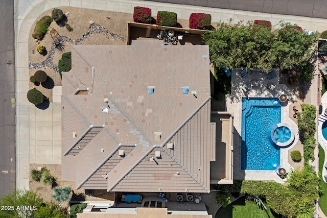 view from above of property featuring a pool area