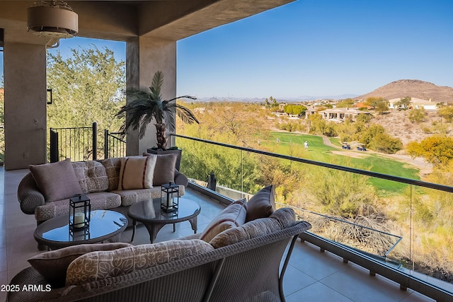 balcony featuring a mountain view