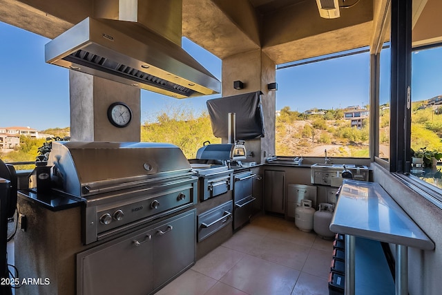 view of patio / terrace with an outdoor kitchen