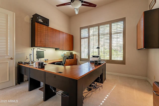 office featuring light colored carpet and ceiling fan