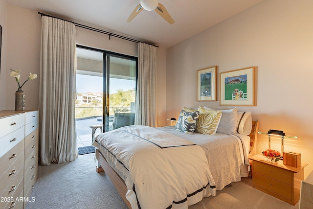 carpeted bedroom with ceiling fan and access to outside