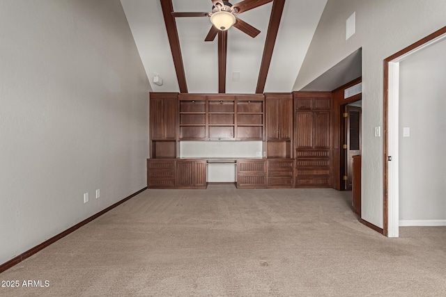 unfurnished living room with ceiling fan, light colored carpet, and high vaulted ceiling