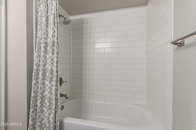 bathroom featuring shower / bath combination with curtain