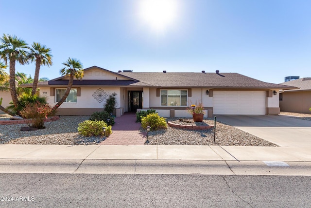 ranch-style home with a garage