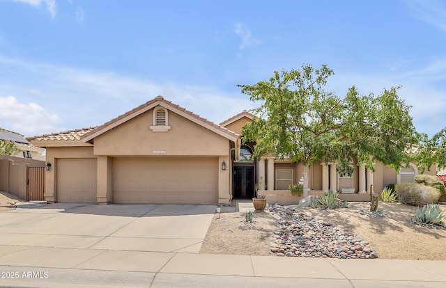 16219 S 14th Way, Phoenix, AZ 85048 - view of front facade featuring stucco siding, a garage, driveway, and a tile roof