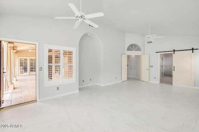 16219 S 14th Way, Phoenix, AZ 85048 - unfurnished living room with ceiling fan, a barn door, baseboards, high vaulted ceiling, and light marble finish flooring