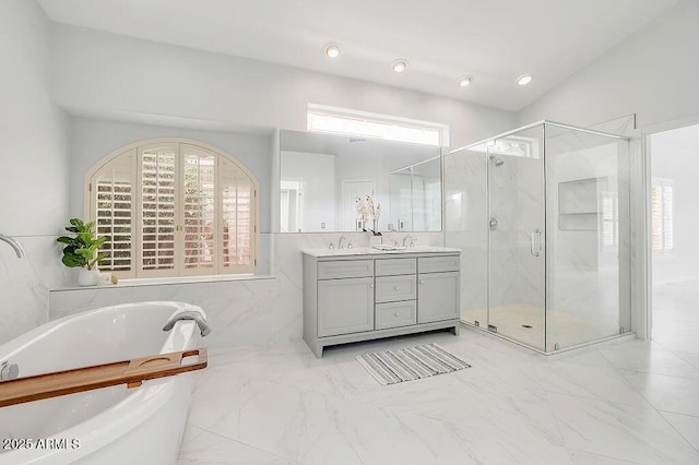 16219 S 14th Way, Phoenix, AZ 85048 - full bath with a freestanding tub, double vanity, a marble finish shower, plenty of natural light, and recessed lighting