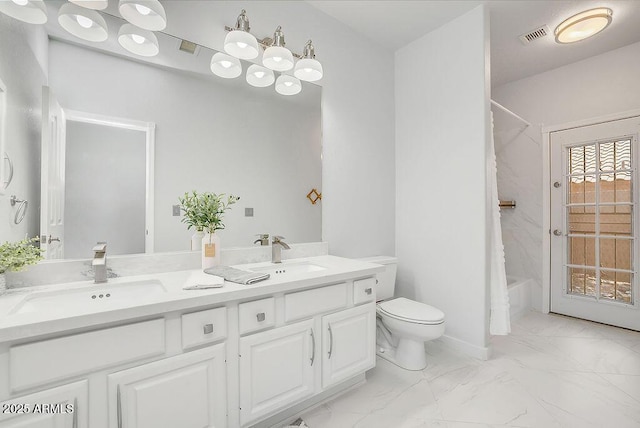 16219 S 14th Way, Phoenix, AZ 85048 - full bath with double vanity, marble finish floors, toilet, and shower / bathtub combination