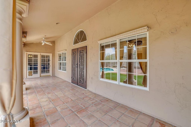 16219 S 14th Way, Phoenix, AZ 85048 - view of exterior entry featuring stucco siding and ceiling fan