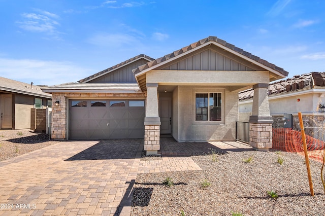 view of front of property featuring a garage