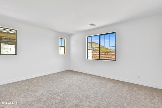 view of carpeted spare room