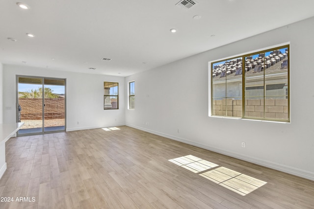 empty room with light wood-type flooring