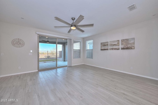 unfurnished room with ceiling fan and light hardwood / wood-style flooring