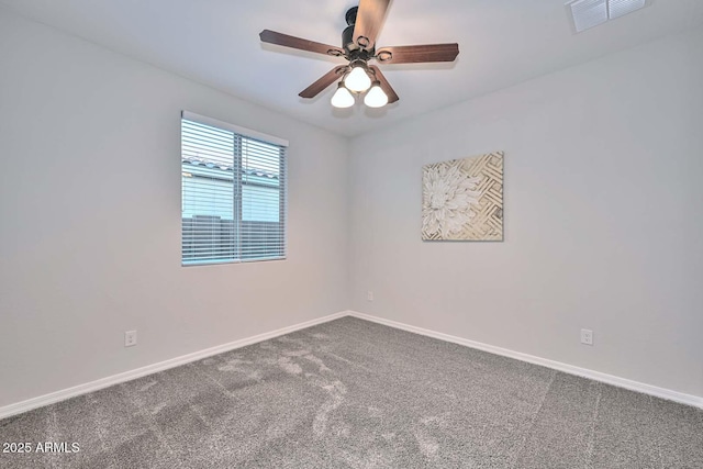 empty room featuring ceiling fan and carpet flooring