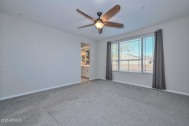 carpeted empty room with ceiling fan