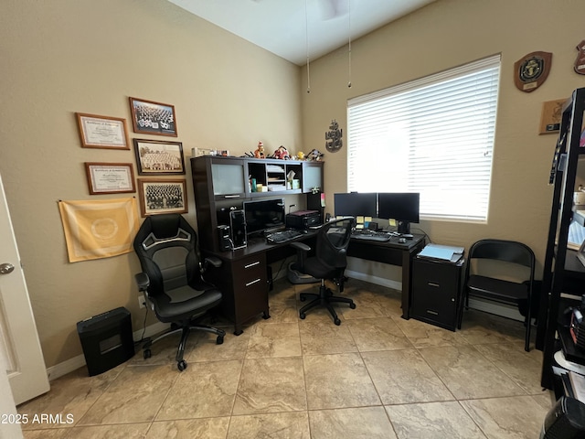 office area with light tile patterned flooring and baseboards