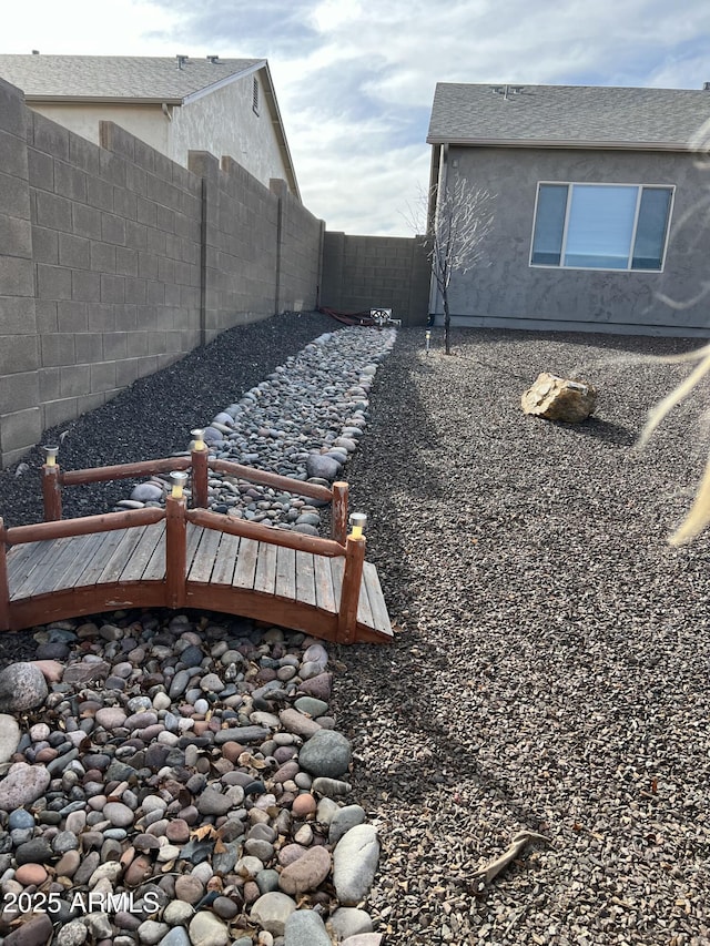 view of yard featuring a fenced backyard