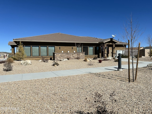 view of front of home featuring stucco siding