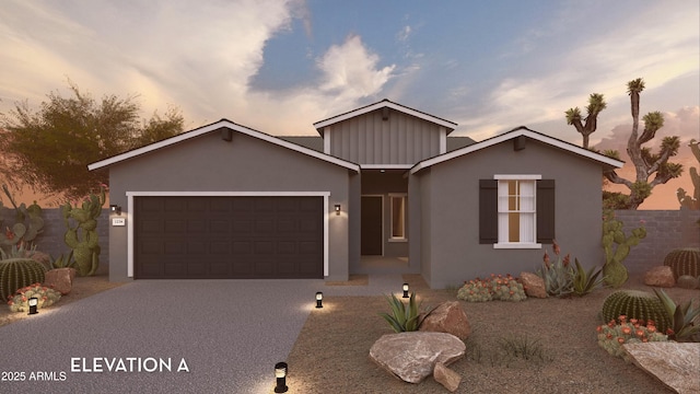 17595 N Bolerno Dr, Maricopa, AZ 85138 - view of front of house with a garage, concrete driveway, stucco siding, and board and batten siding