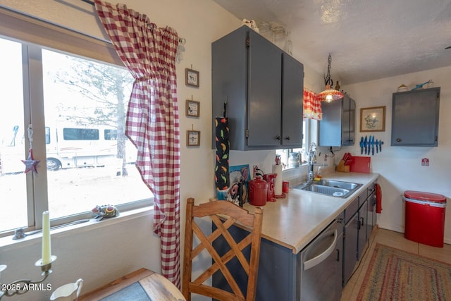 kitchen featuring stainless steel dishwasher and sink