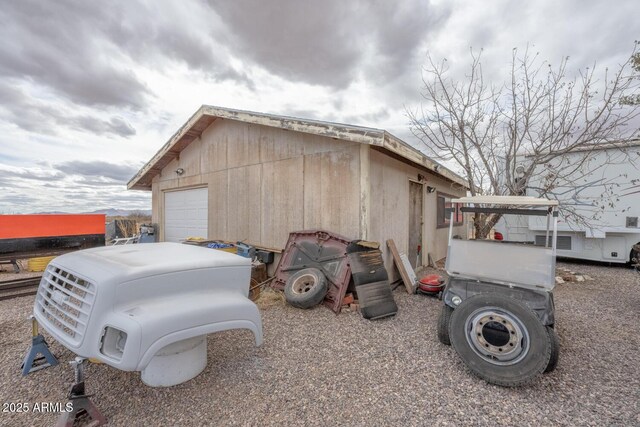 view of outdoor structure with a garage