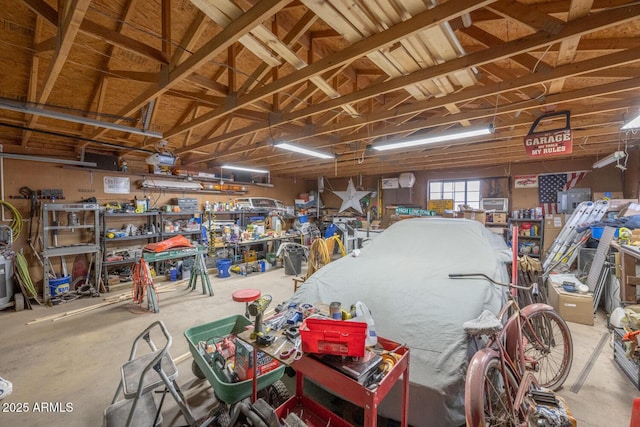 garage with a workshop area