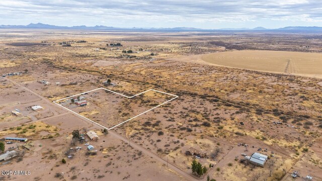 bird's eye view with a mountain view and a rural view