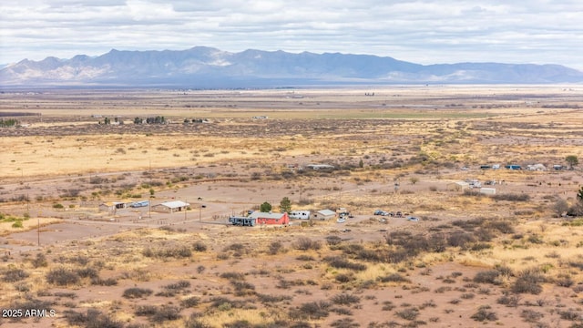 view of mountain feature with a rural view