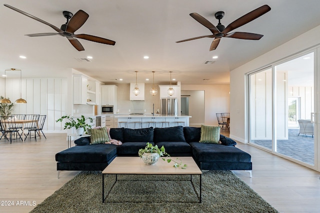 3939 S Veronica Ln, Gold Canyon, AZ 85118 - living room with light wood finished floors, ceiling fan, and recessed lighting
