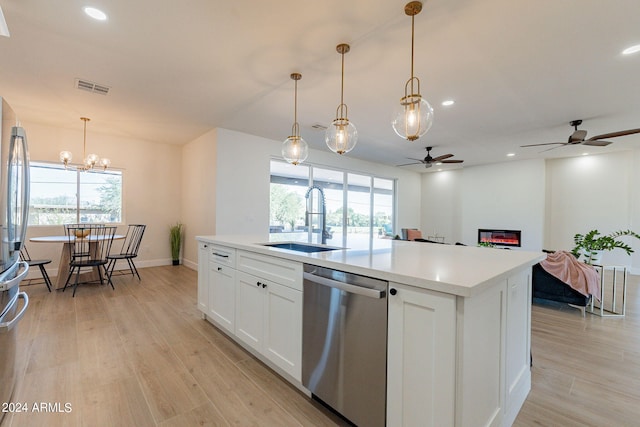 3939 S Veronica Ln, Gold Canyon, AZ 85118 - kitchen featuring light wood-style flooring, visible vents, appliances with stainless steel finishes, a sink, and a wealth of natural light