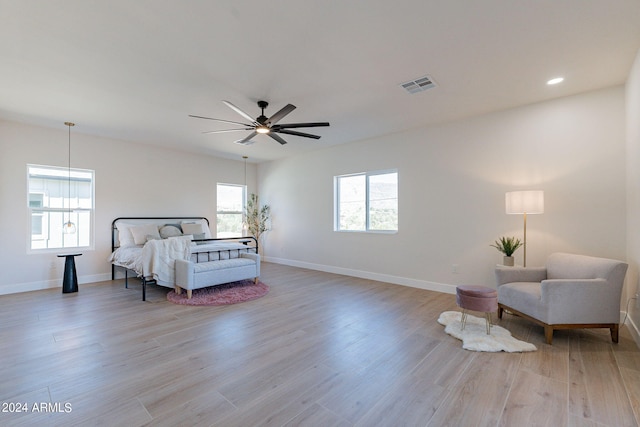 3939 S Veronica Ln, Gold Canyon, AZ 85118 - bedroom with baseboards, ceiling fan, visible vents, and light wood-type flooring