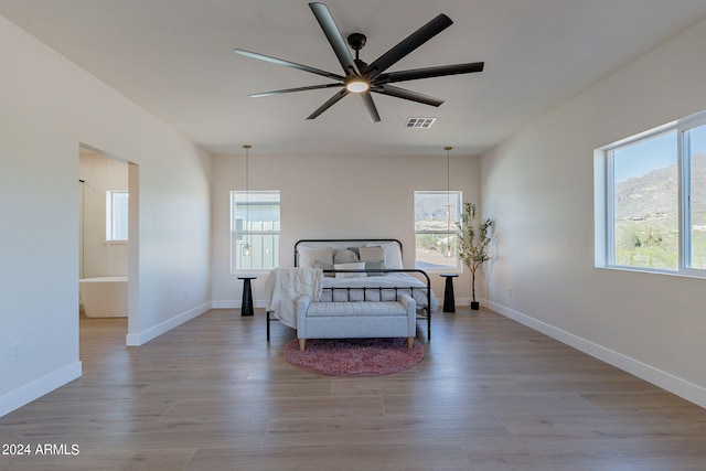 3939 S Veronica Ln, Gold Canyon, AZ 85118 - bedroom featuring baseboards, visible vents, wood finished floors, and a ceiling fan