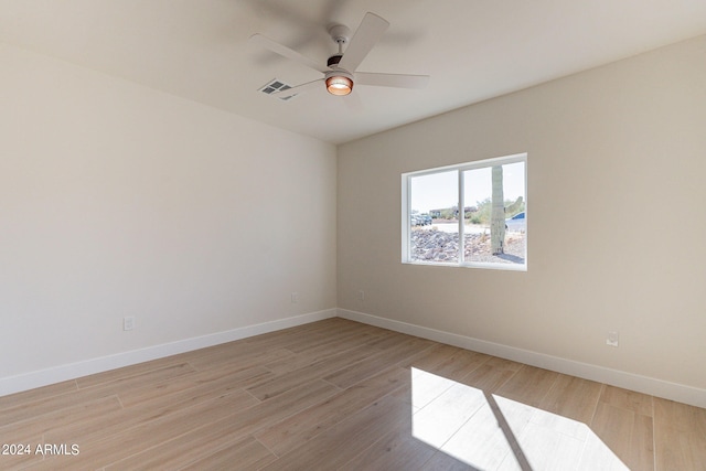 3939 S Veronica Ln, Gold Canyon, AZ 85118 - spare room featuring baseboards, visible vents, light wood-style flooring, and a ceiling fan