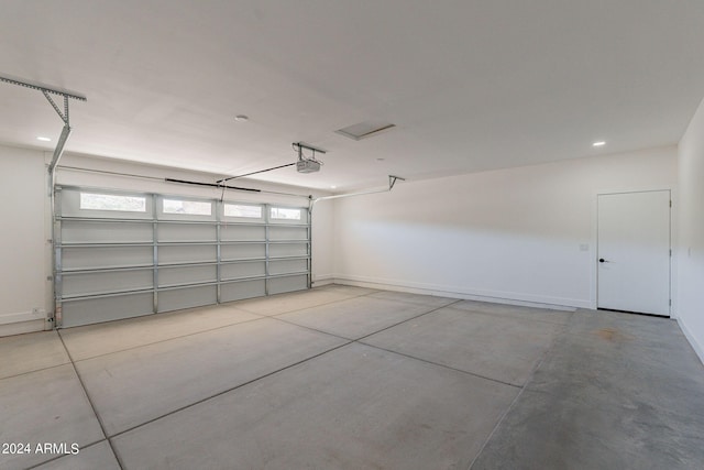 3939 S Veronica Ln, Gold Canyon, AZ 85118 - garage featuring baseboards and a garage door opener