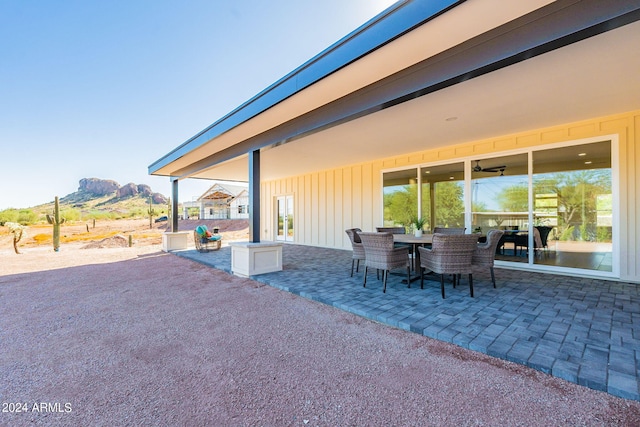 3939 S Veronica Ln, Gold Canyon, AZ 85118 - view of patio / terrace featuring a mountain view and outdoor dining space