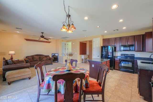 dining room featuring light tile patterned floors, visible vents, and recessed lighting