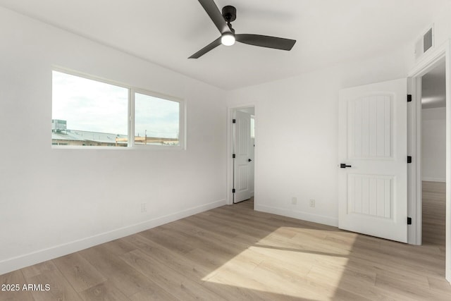 unfurnished bedroom featuring light hardwood / wood-style flooring and ceiling fan