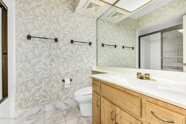 7115 E Buena Terra Way, Paradise Valley, AZ 85253 - full bathroom with wallpapered walls, vanity, toilet, marble finish floors, and a shower with shower door