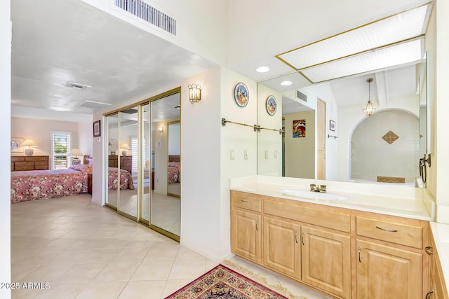 7115 E Buena Terra Way, Paradise Valley, AZ 85253 - full bath featuring ensuite bathroom, vanity, tile patterned flooring, and recessed lighting