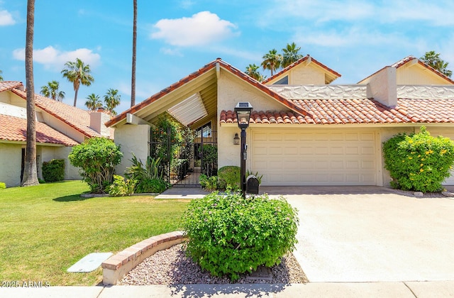 7115 E Buena Terra Way, Paradise Valley, AZ 85253 - view of front of house with a tile roof, an attached garage, driveway, a front lawn, and stucco siding
