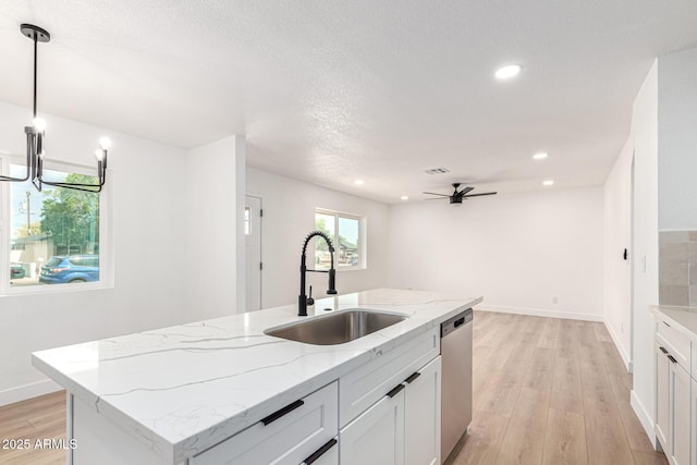 524 S Pioneer, Mesa, AZ 85204 - kitchen with a sink, light wood-type flooring, dishwasher, white cabinetry, and recessed lighting