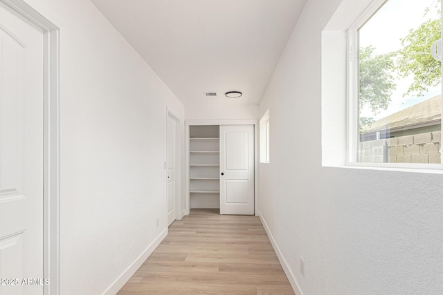 524 S Pioneer, Mesa, AZ 85204 - hallway with baseboards and light wood-style floors