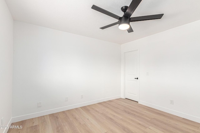 524 S Pioneer, Mesa, AZ 85204 - spare room with light wood-style floors, ceiling fan, and baseboards