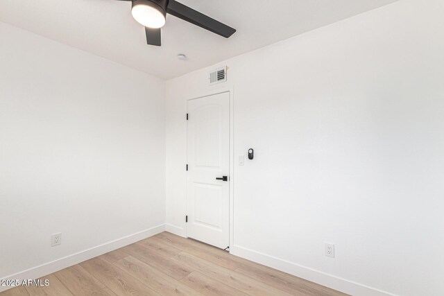 524 S Pioneer, Mesa, AZ 85204 - empty room featuring baseboards, light wood-style flooring, and a ceiling fan
